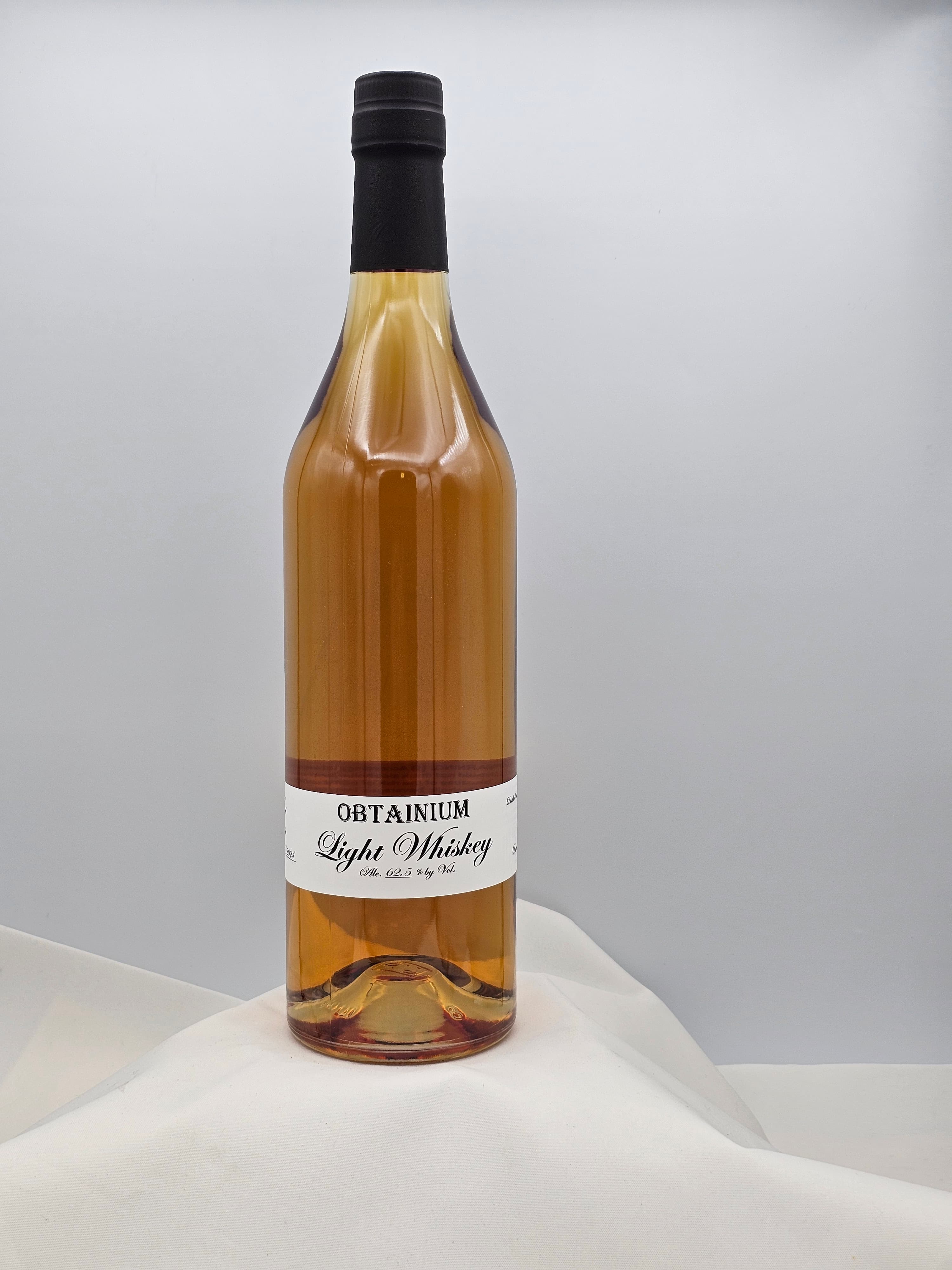 Obtainium 17 year Light Whiskey
